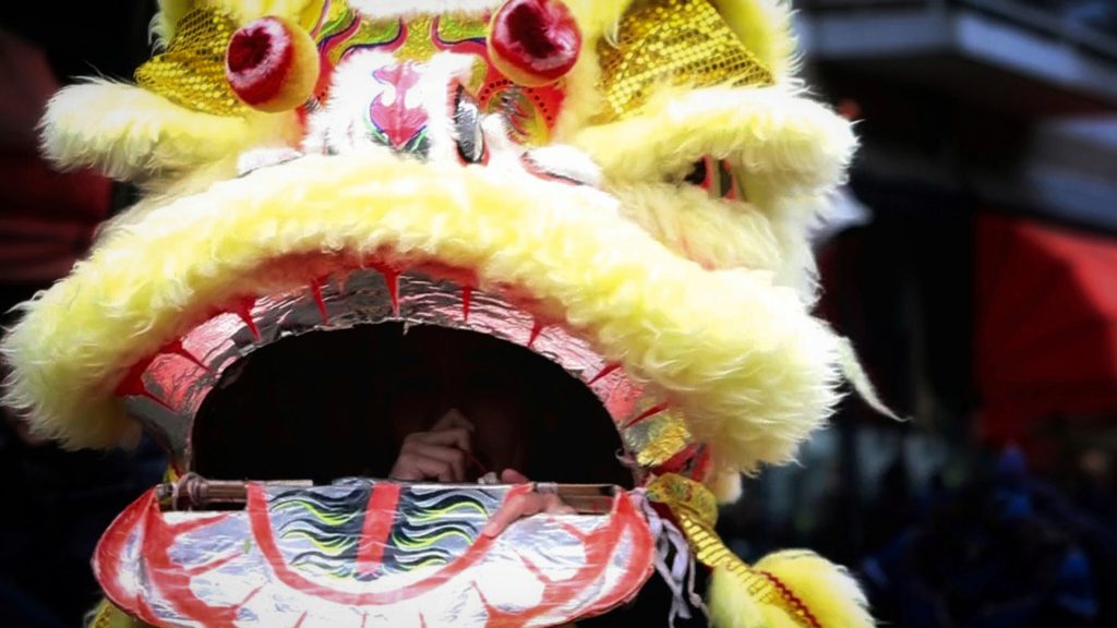 Gele leeuw. Leeuwendans Chinees Nieuwjaar Rotterdam.